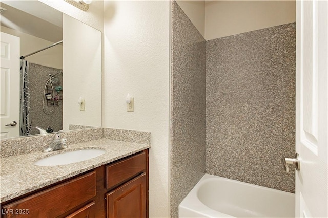 bathroom featuring vanity and shower / bath combination with curtain