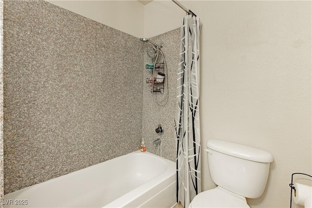 bathroom with toilet and shower / bath combo with shower curtain