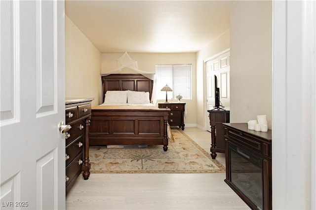 bedroom featuring light hardwood / wood-style floors