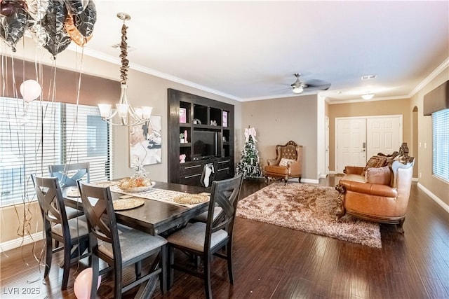 dining space featuring crown molding, ceiling fan with notable chandelier, and dark hardwood / wood-style floors