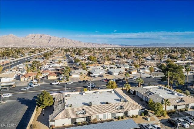 birds eye view of property featuring a mountain view