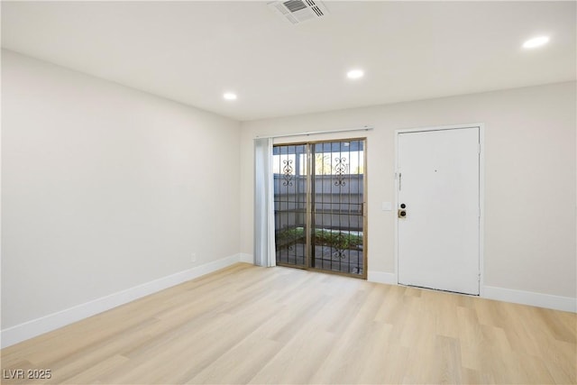 empty room featuring light hardwood / wood-style flooring