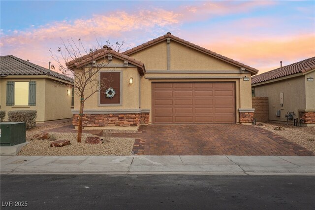 view of front of property with a garage