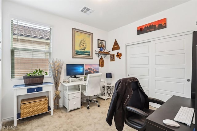 office with visible vents and light colored carpet