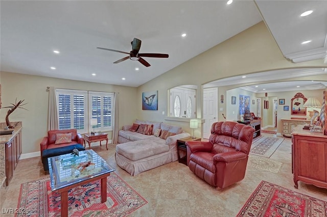 living room featuring vaulted ceiling and ceiling fan