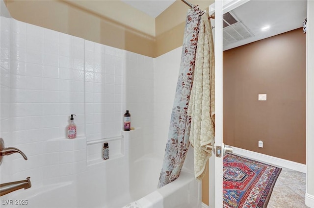 bathroom featuring shower / tub combo with curtain