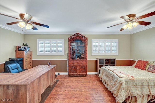 bedroom featuring multiple windows and ornamental molding