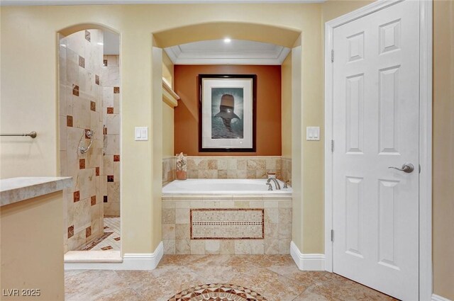 bathroom with shower with separate bathtub and ornamental molding