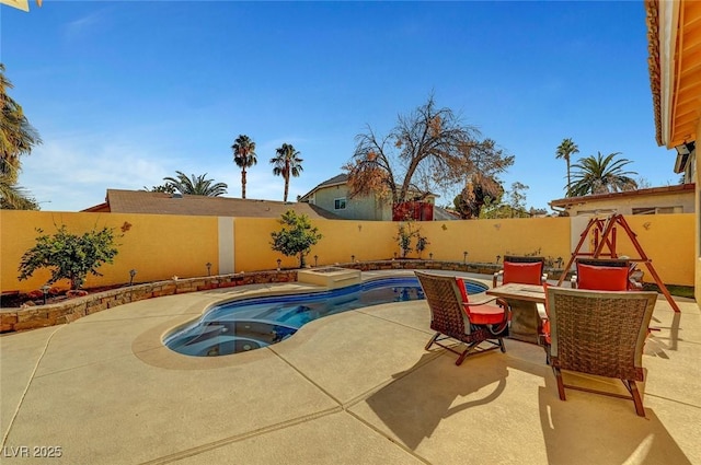 view of pool featuring a patio