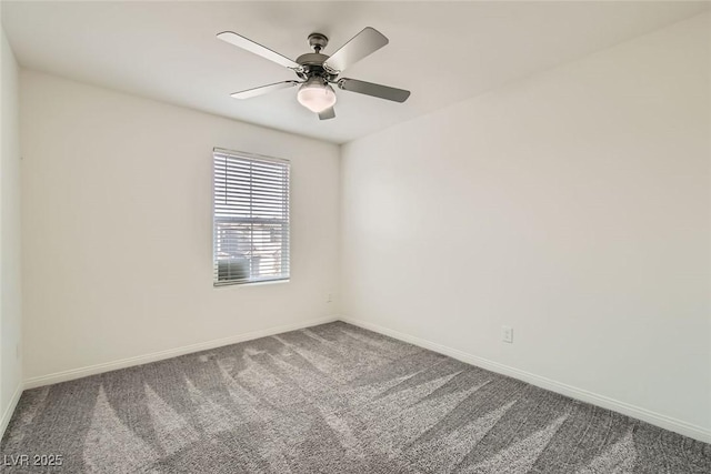 spare room featuring ceiling fan and carpet flooring