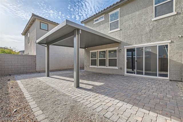 back of house featuring a patio