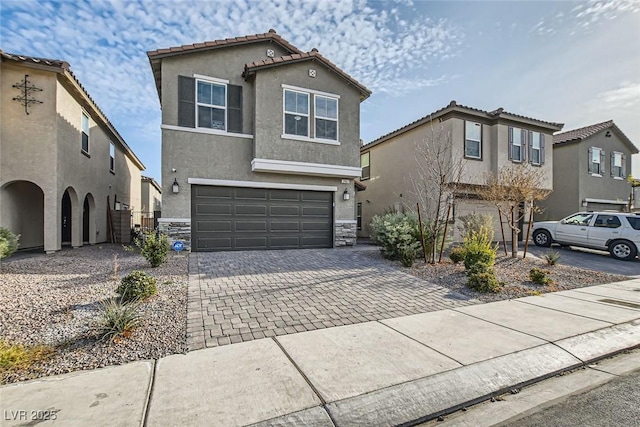 view of front of property featuring a garage