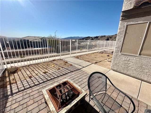 view of patio / terrace with a fire pit