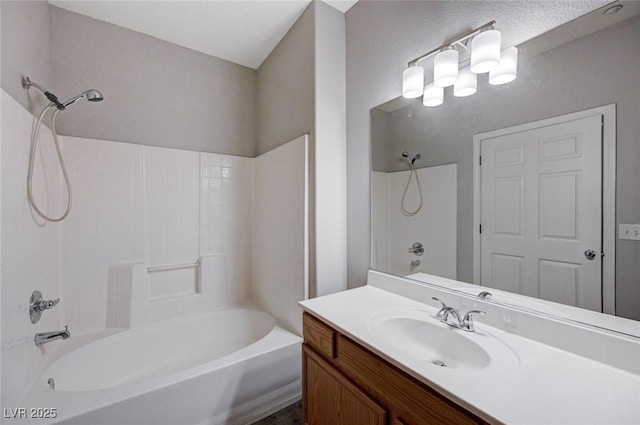 bathroom featuring vanity and bathing tub / shower combination