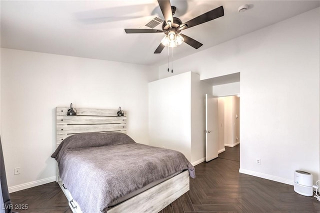 bedroom featuring dark parquet floors and ceiling fan