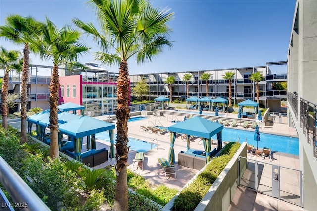 view of swimming pool featuring a patio area