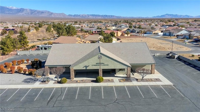 bird's eye view with a residential view and a mountain view