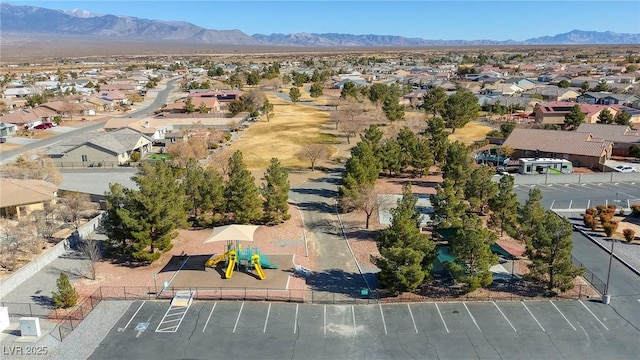 birds eye view of property with a residential view and a mountain view