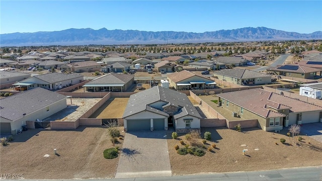 bird's eye view with a mountain view and a residential view