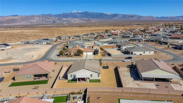 birds eye view of property featuring a residential view and a mountain view