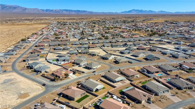 aerial view featuring a residential view and a mountain view