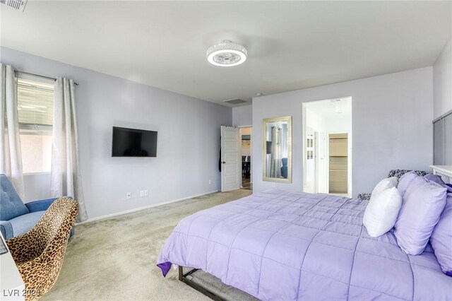 carpeted bedroom featuring visible vents