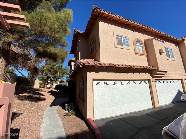 view of home's exterior with a garage