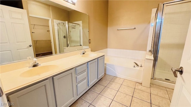 bathroom with vanity, separate shower and tub, and tile patterned floors