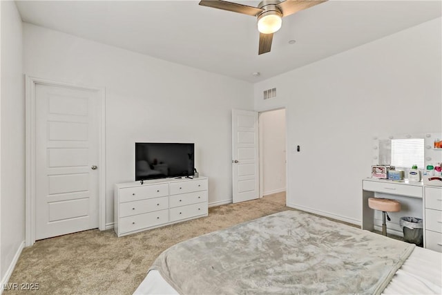 carpeted bedroom with ceiling fan