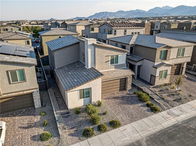 drone / aerial view featuring a mountain view