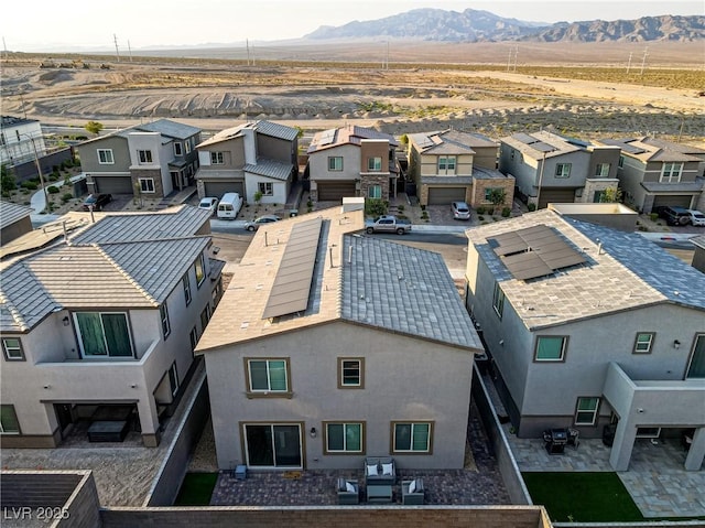 drone / aerial view featuring a mountain view