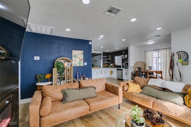 living room with light wood-type flooring