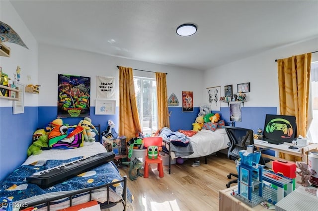 bedroom featuring hardwood / wood-style floors