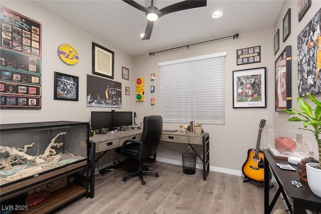 office space featuring recessed lighting, wood finished floors, a ceiling fan, and baseboards