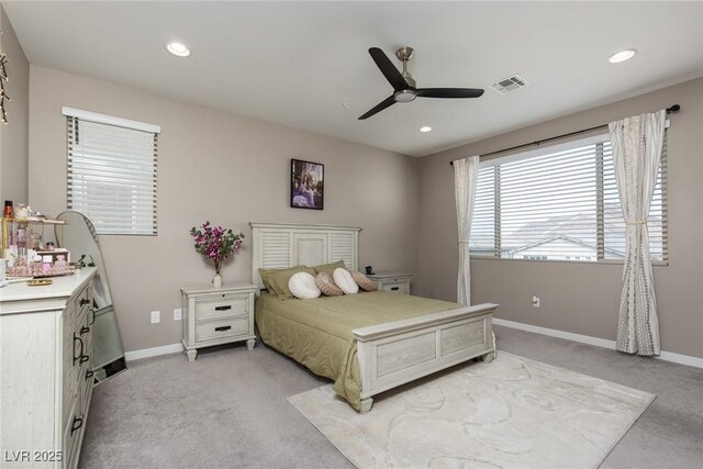 bedroom featuring ceiling fan and light colored carpet