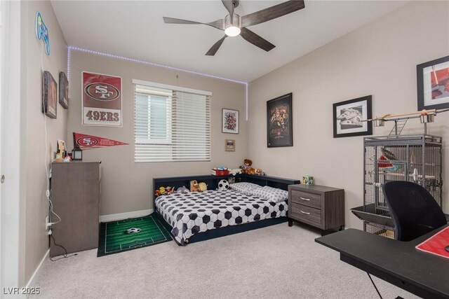 bedroom featuring ceiling fan and carpet floors