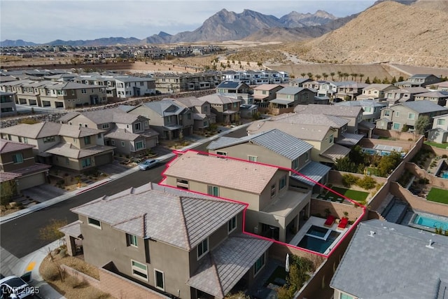 aerial view with a residential view and a mountain view