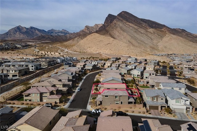 bird's eye view featuring a residential view and a mountain view