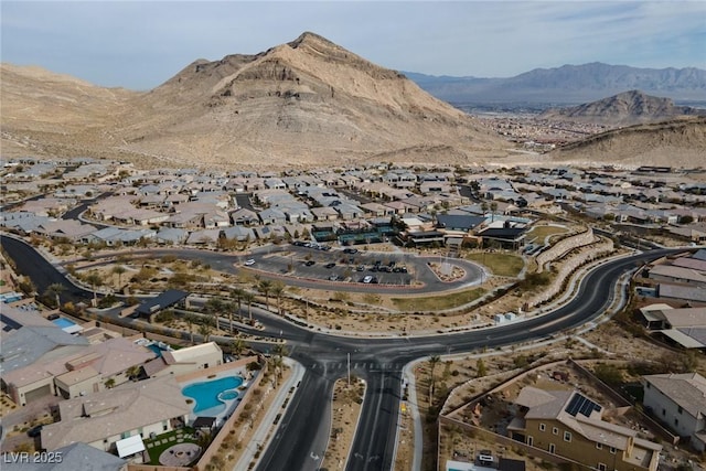 drone / aerial view featuring a mountain view