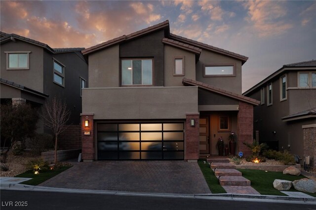 view of front of property with a garage