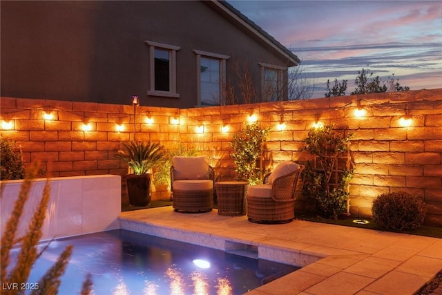 view of swimming pool with a pool and a patio area