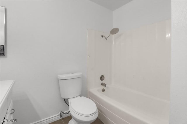 bathroom with shower / washtub combination and toilet