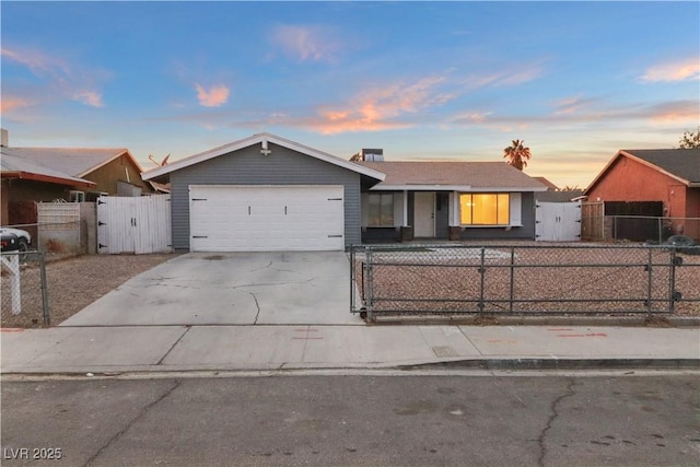 ranch-style house featuring a garage