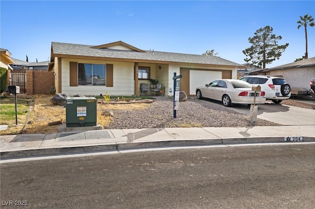 ranch-style home with a garage