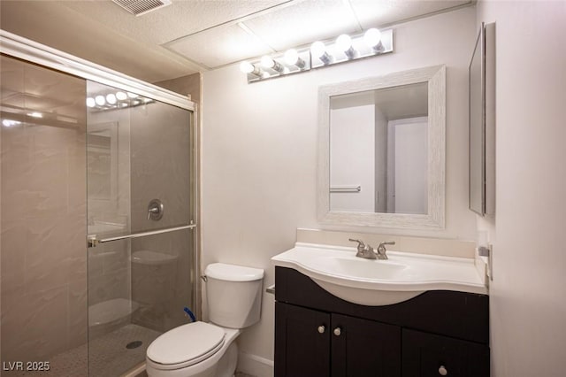 1701 E Katie Ave Unit 65, Las Vegas, NV 89119 - bathroom with a shower stall, toilet, and vanity