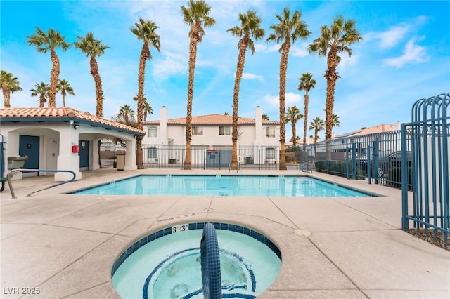 view of pool featuring a community hot tub