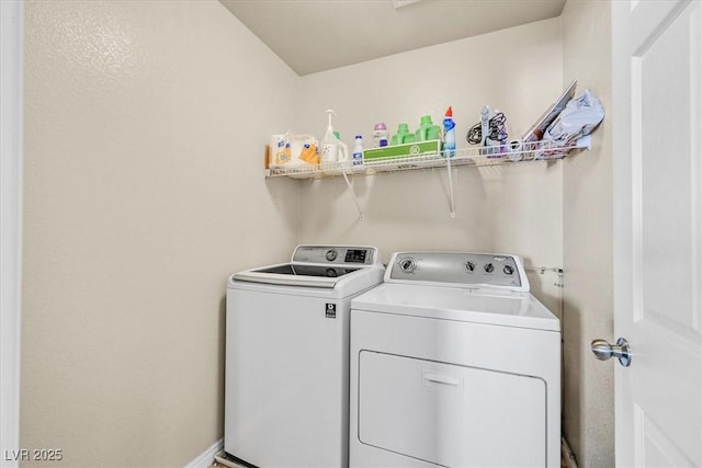 laundry area with washing machine and dryer