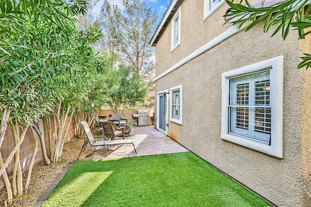 view of yard with a patio area