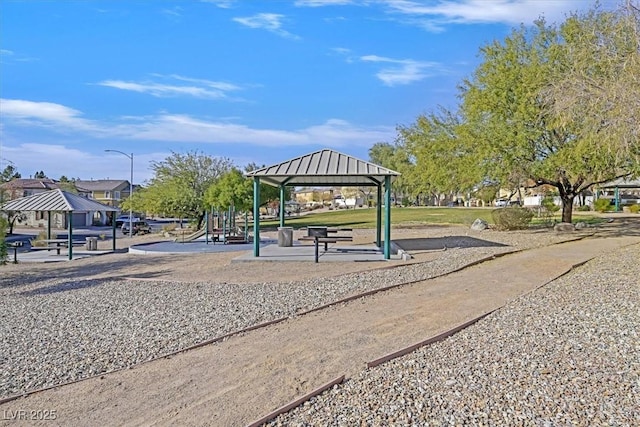 view of community featuring a gazebo and a playground