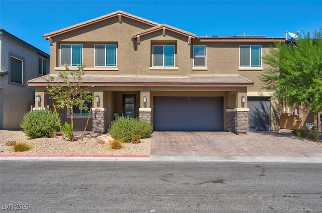 view of front of property featuring a garage